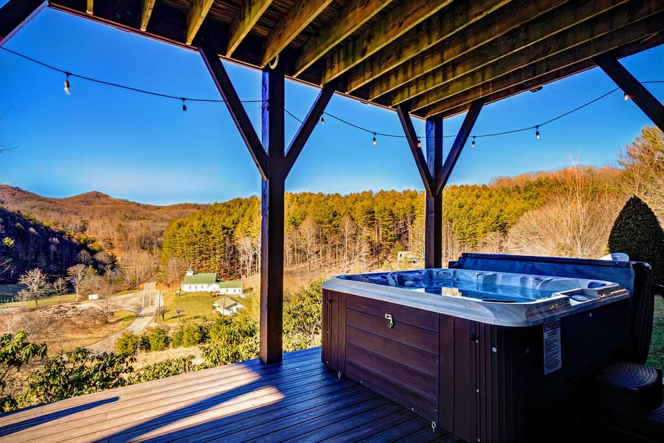 Watch your worries melt away in the private hot tub.