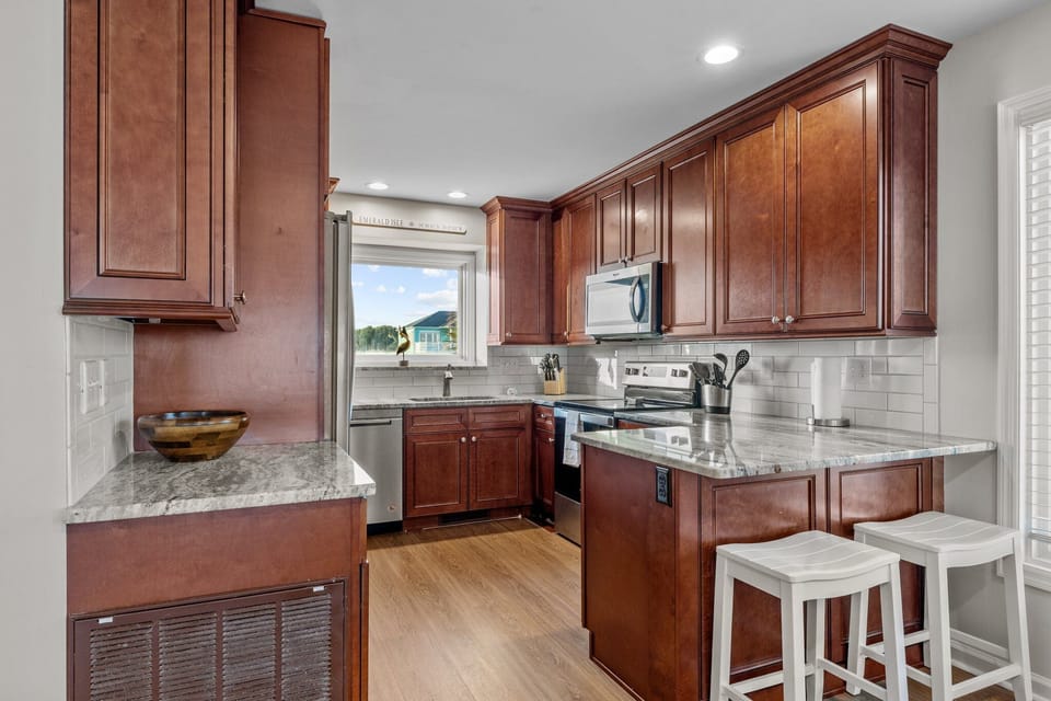 One of TWO full kitchens. East side.
