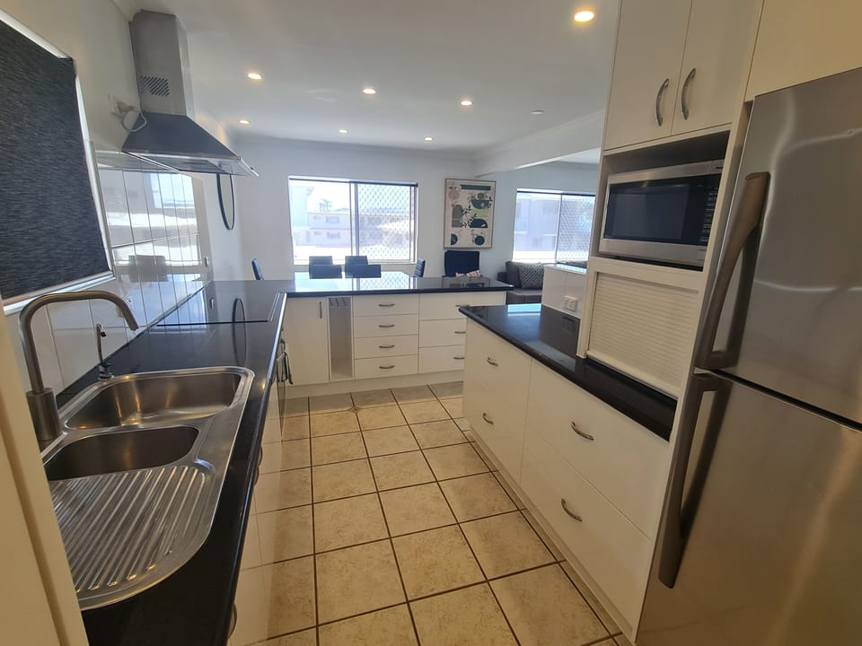 Apartment, 3 Bedrooms, Beachside | Private kitchen | Full-size fridge, microwave, stovetop, electric kettle