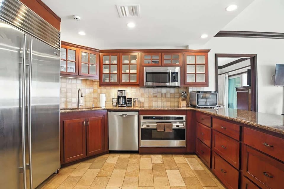 Granite counters & top appliances — island meals made simple.