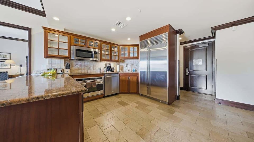 Cook in style with a fully equipped chef’s kitchen featuring top-of-the-line appliances, granite countertops, and everything you need to create island-inspired meals
