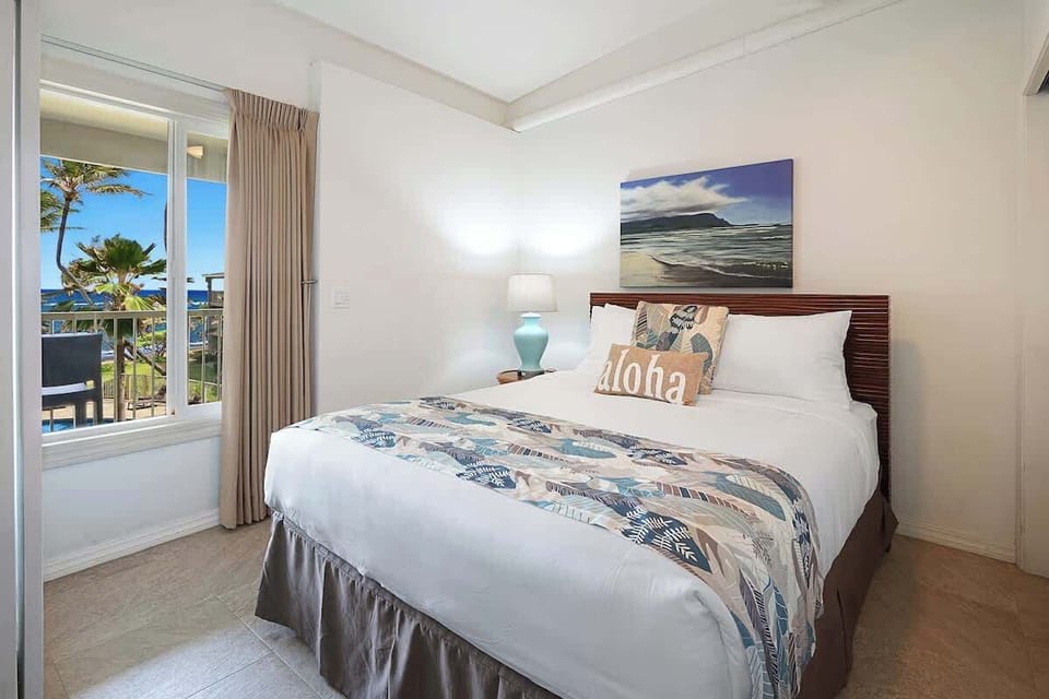 Cool comfortable second bedroom with a queen bed