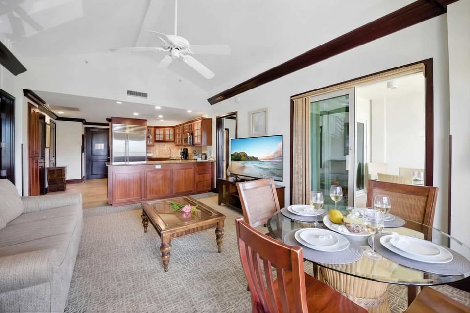 Expansive living and dining designed for gathering in island style