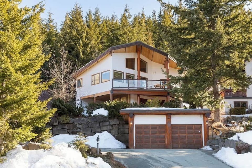 - Your mountain retreat surrounded by evergreens and scenic trails  
- Spacious chalet with balcony views and double garage access for guests  
- Peaceful escape near hiking paths and ski slopes for nature lovers  
