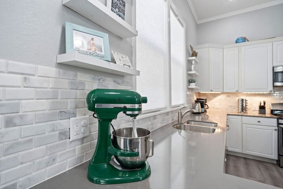 Strategically placed and thoughtfully provided amenities are scattered throughout. Including the A Stay Above The Rest signature staple - A Kitchen-Aid Stand Mixer.