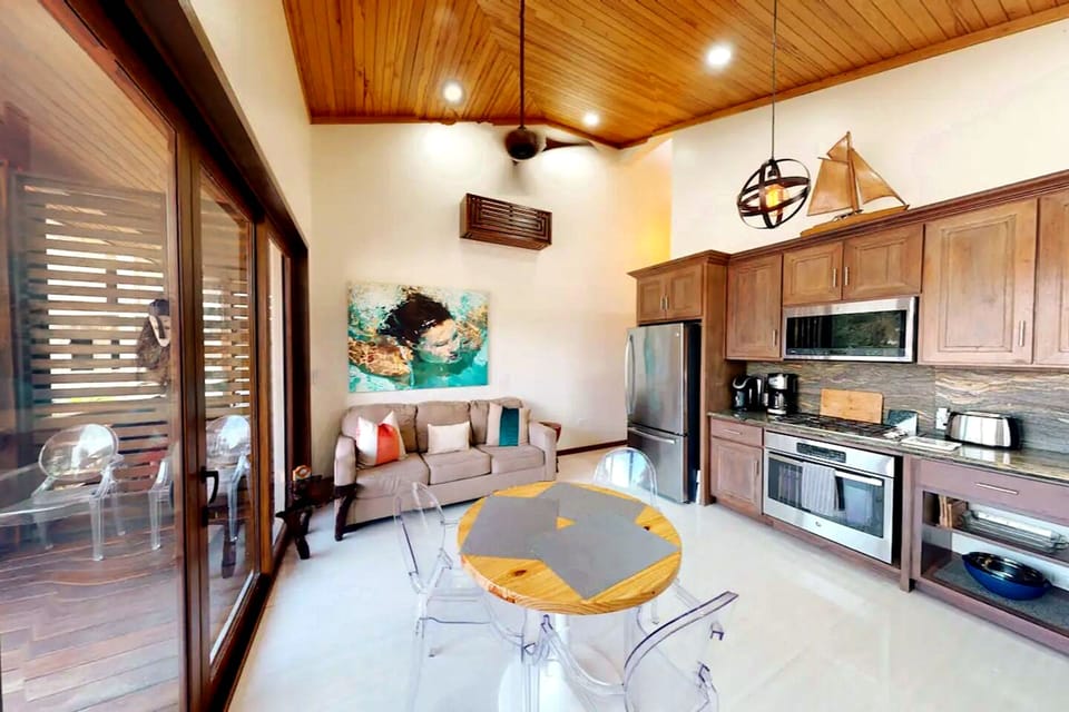 The villa kitchen is fitted with stainless steel appliances and granite countertops so you can enjoy cooking in paradise 