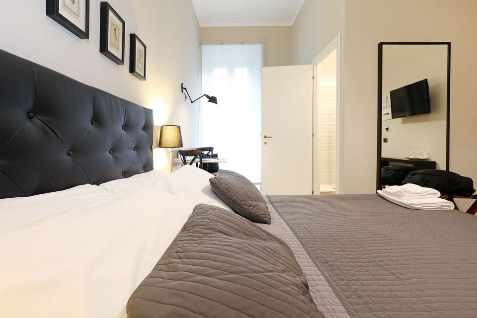 Double Room | Minibar, in-room safe, individually furnished, desk