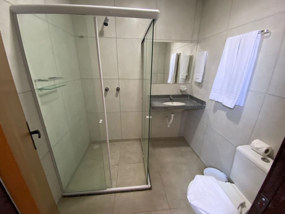 Standard Double Room | Bathroom | Shower, hair dryer, towels, soap
