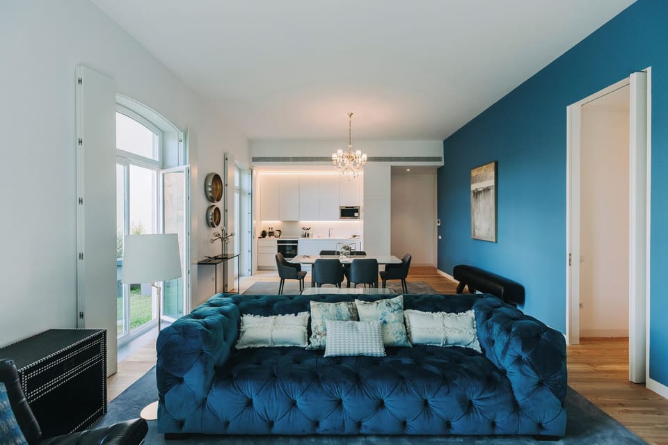 Apartment, 2 Bedrooms, Jetted Tub | Living area | 24-inch LCD TV with cable channels, TV, pay movies