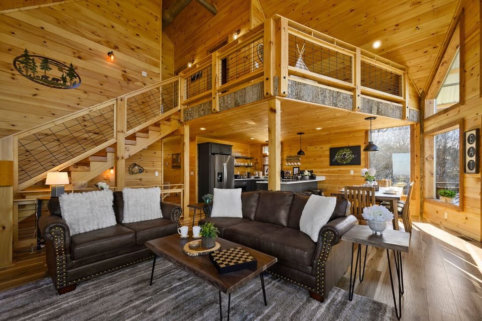 Another living room view with loft