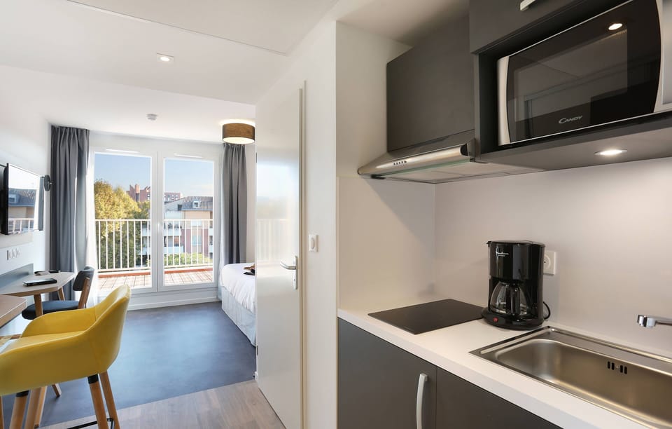 Whip up a snack in the kitchenette. Please note that we cannot guarantee a balcony in your unit.