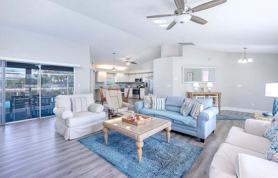 Spacious Living Room with Chair and Couches