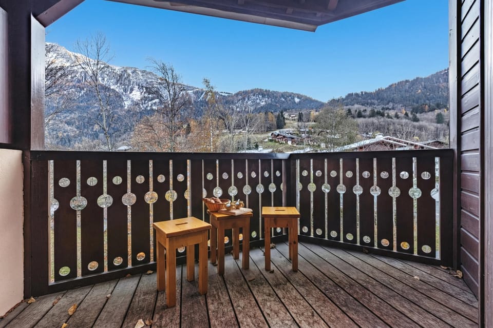 Large balcony with mountain view
