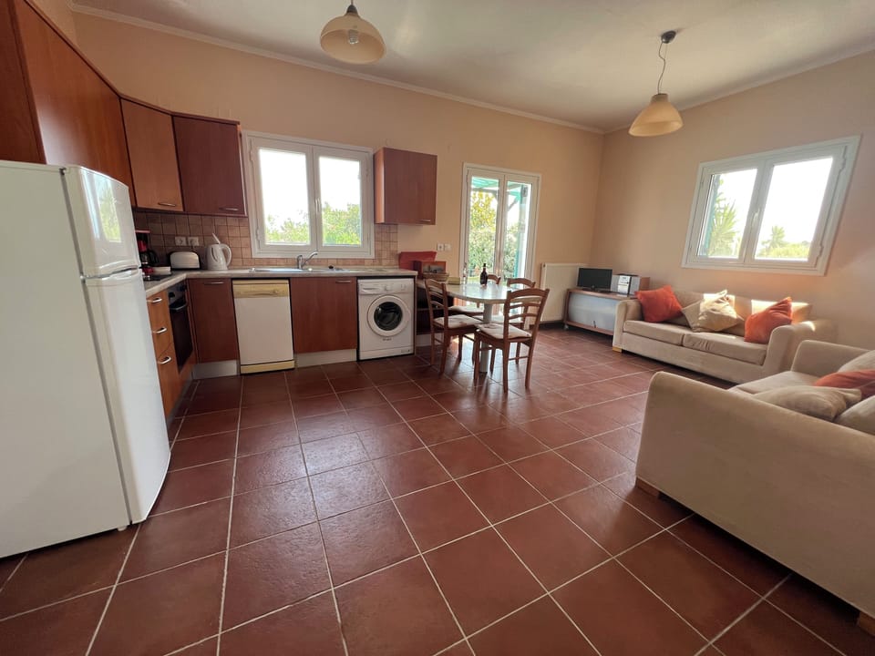 Spacious lounge/kitchen with two comfy sofas