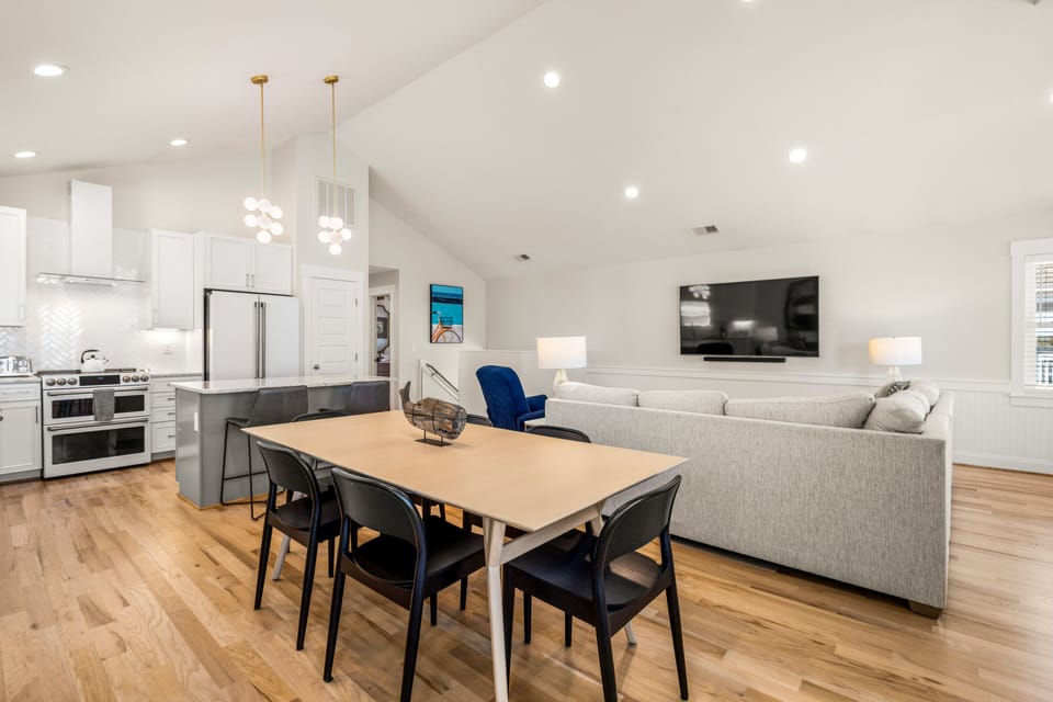 Dining table with seating for 6, breakfast table seats 4, & 2 at the island.