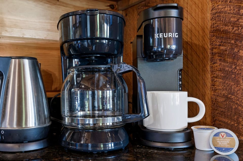 Drip coffee maker, pour over and Keurig machine. Coffee grounds and KCups provid