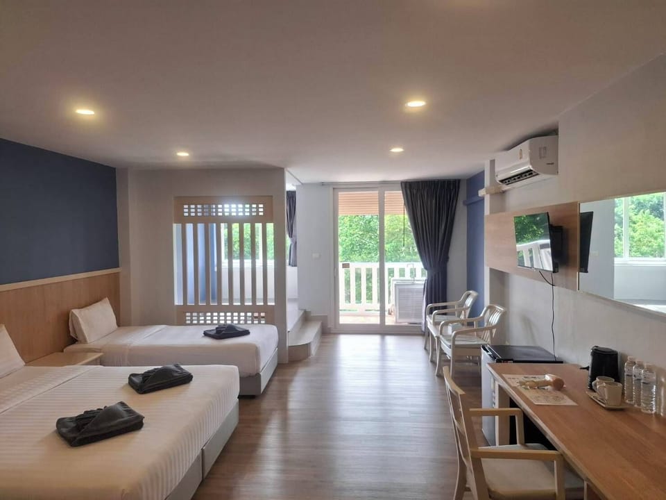 Family Room | In-room safe, desk, rollaway beds, free WiFi