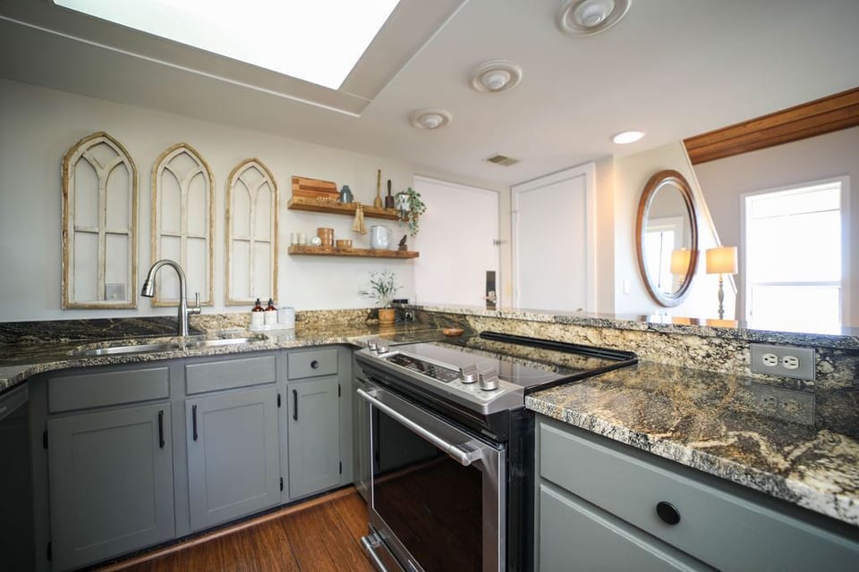 Kitchen open to living area. Enjoy views of the mountains while you cook! 