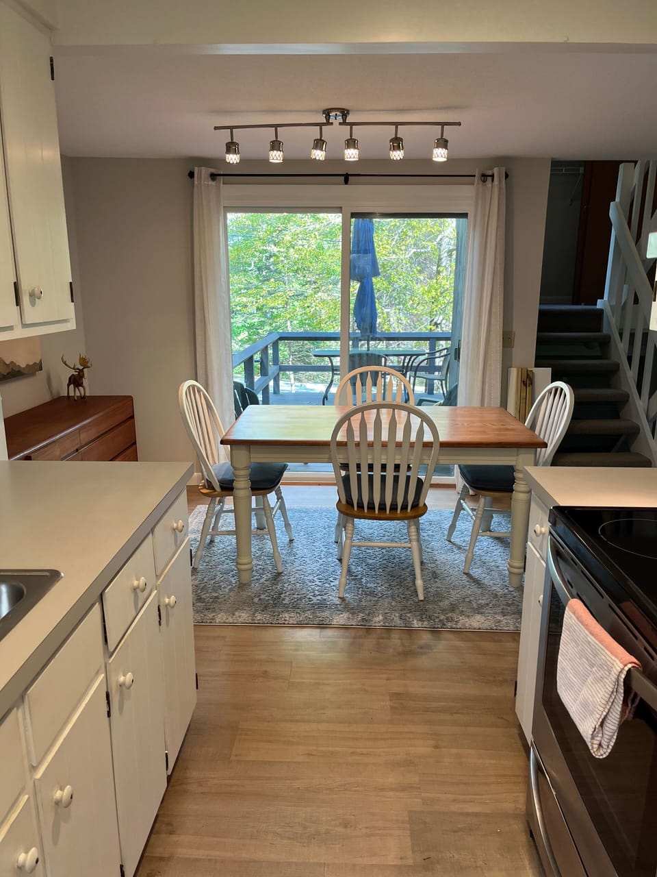 View of dining room (and deck) from kitchen.