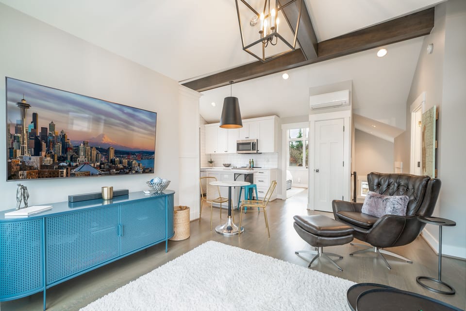 55" TV connected to Wi-Fi with enhanced sound system.
