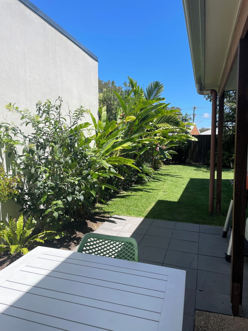 Patio looking to the back fully fenced garden