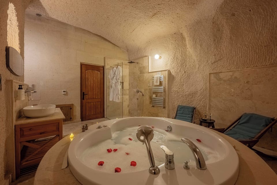 Jupiter - Fully Cave & Jacuzzi | Bathroom | Hair dryer, slippers, towels, soap