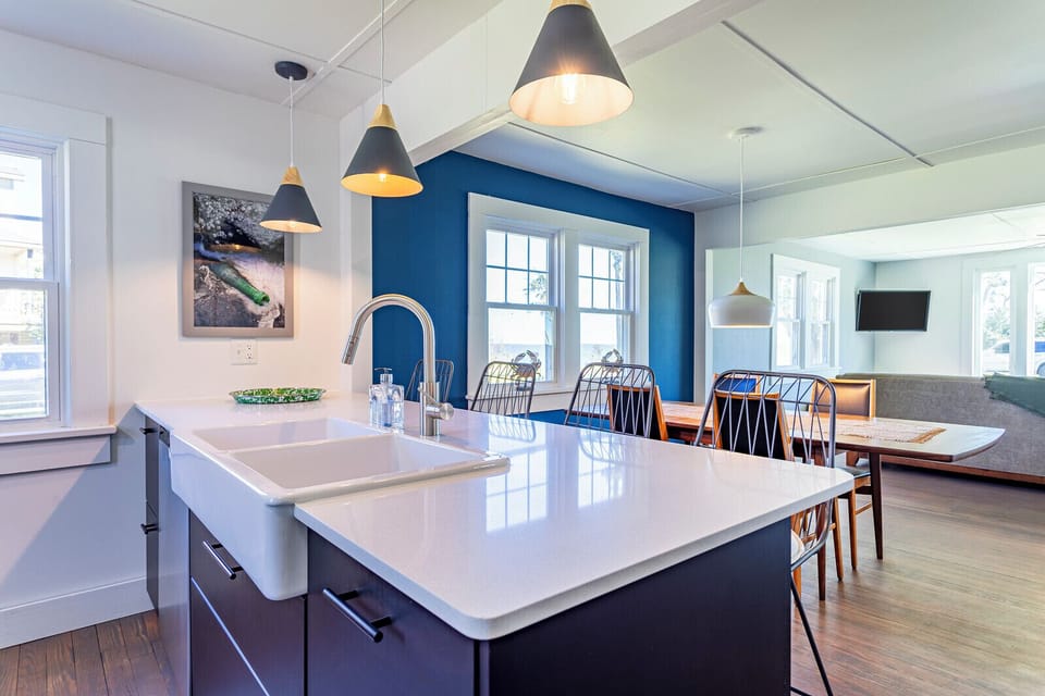 Ceramic farmhouse sink and original photo by Kristina Ulloa