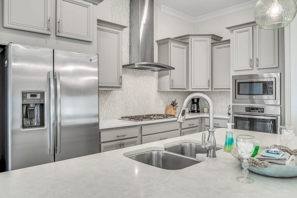 Kitchen with traditional coffee maker as well as Keurig