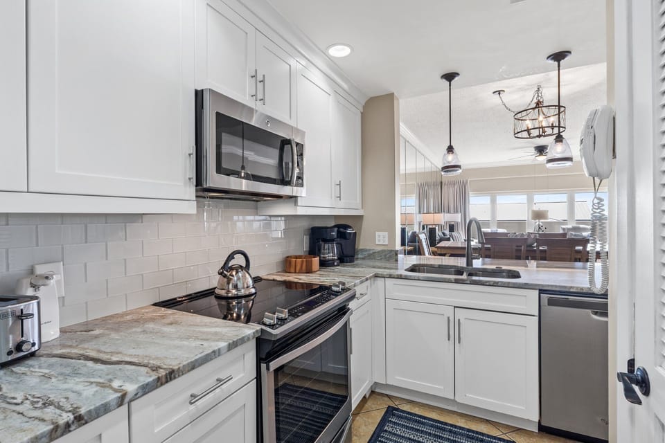 Microwave, oven, coffee pot, blender, toaster, dinnerware, and cookware for all meals