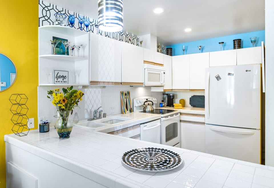 Spacious and functional kitchen with all expected appliances.