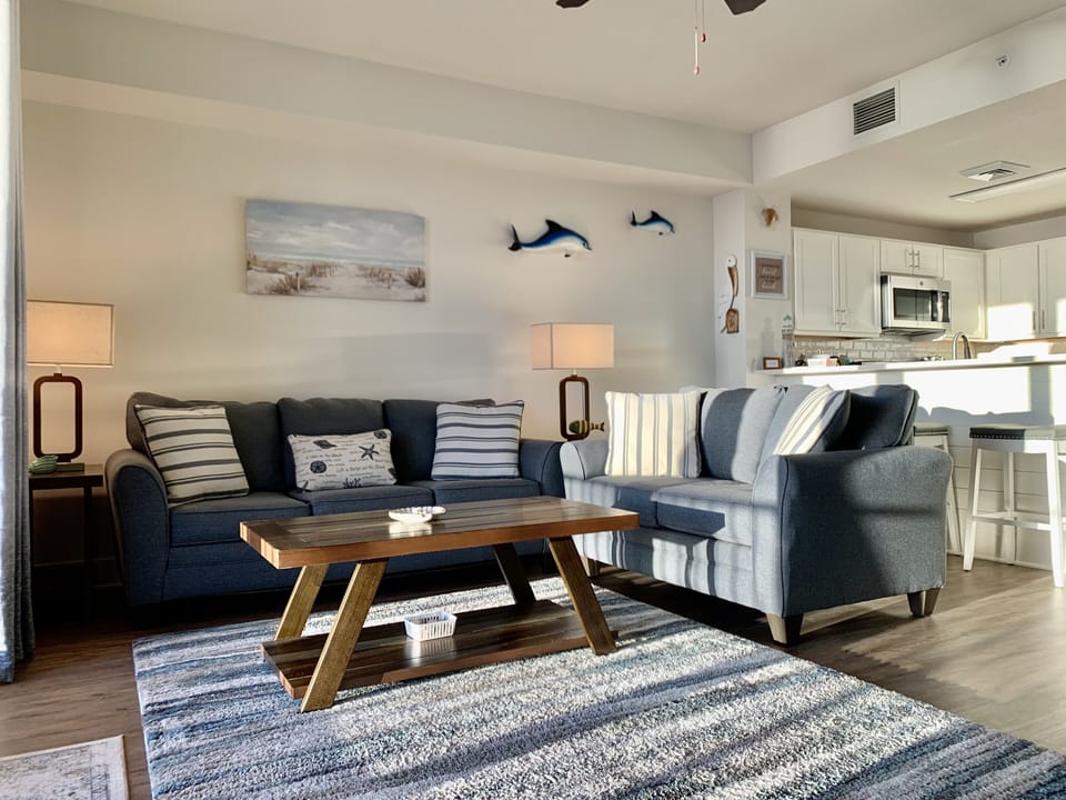 Comfortable living area with gulf views and a sleeper sofa. 