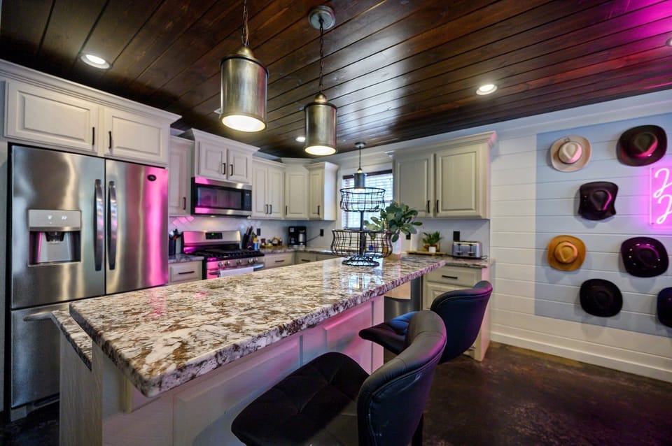 The kitchen is ready for any culinary adventure – complete with modern appliances and plenty of space to create your favorite meals.