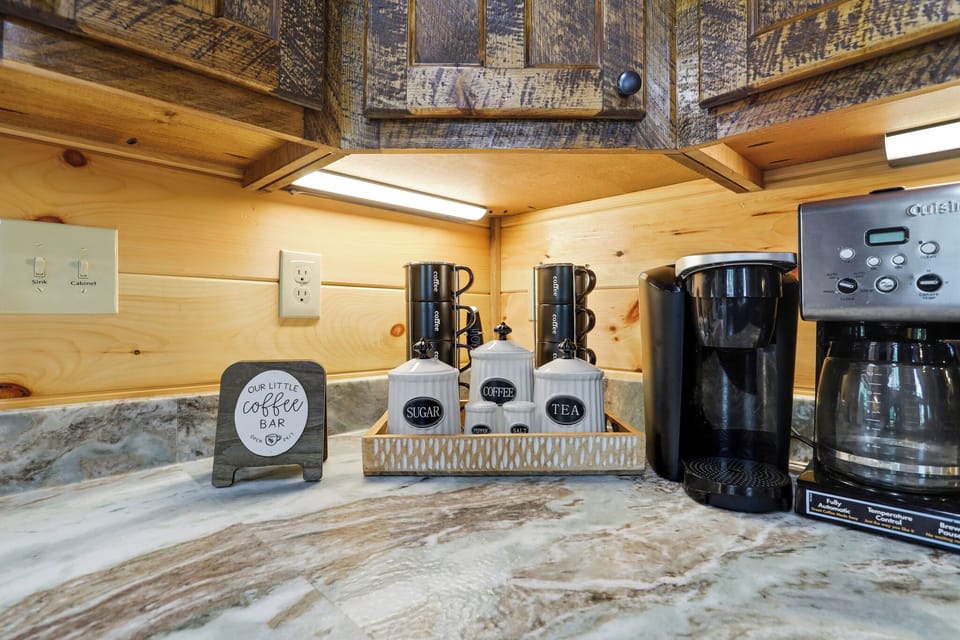 Start your mornings at the charming coffee bar, complete with a coffee maker, Keurig, mugs, and essentials for the perfect cup. Thoughtfully stocked and ready to fuel your next mountain adventure.