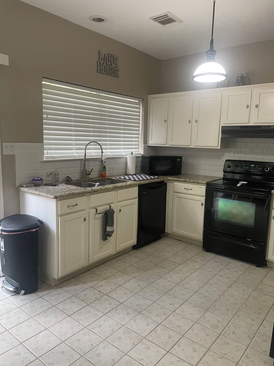 Kitchen with electric appliances, garbage disposal and dishwasher
