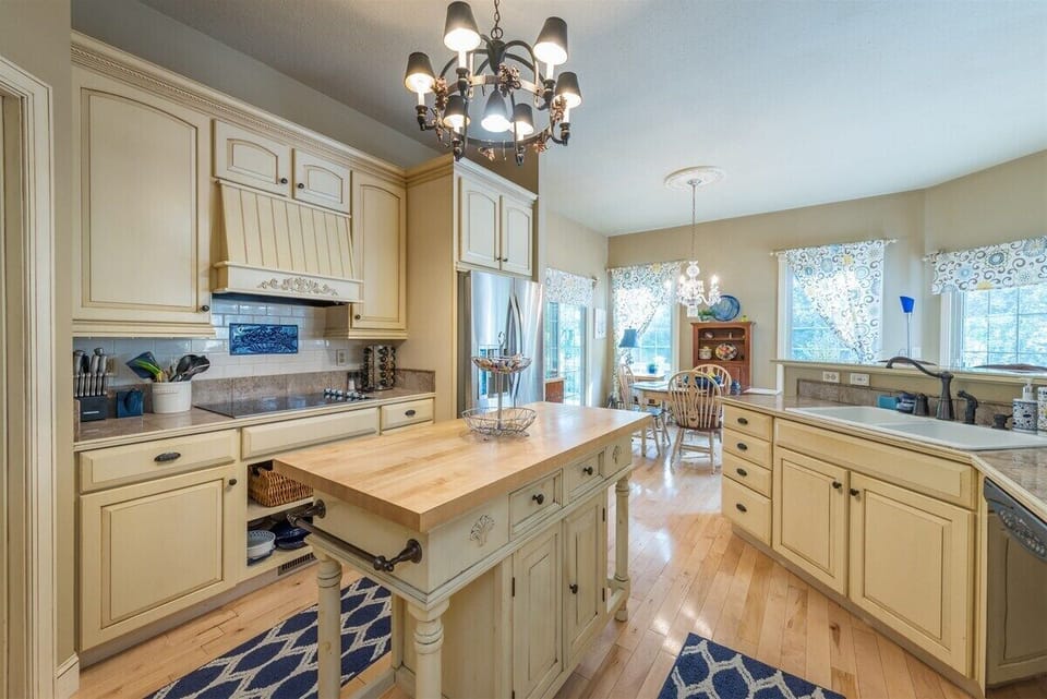 beautiful, updated kitchen matches the light and airy feel of the home