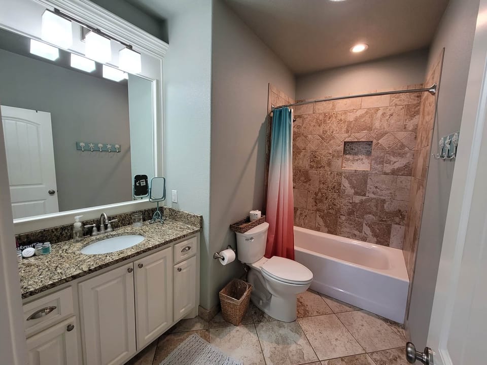 Primary upstairs bath with spacious tub/shower combo