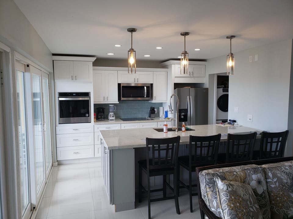 Kitchen with large Island and barstools