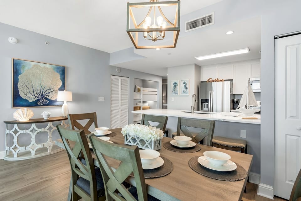 Gulf Front Dining! This beautifully remodeled and decorated home features stunning views of the Gulf of Mexico and Panama City Beach through floor to ceiling windows.