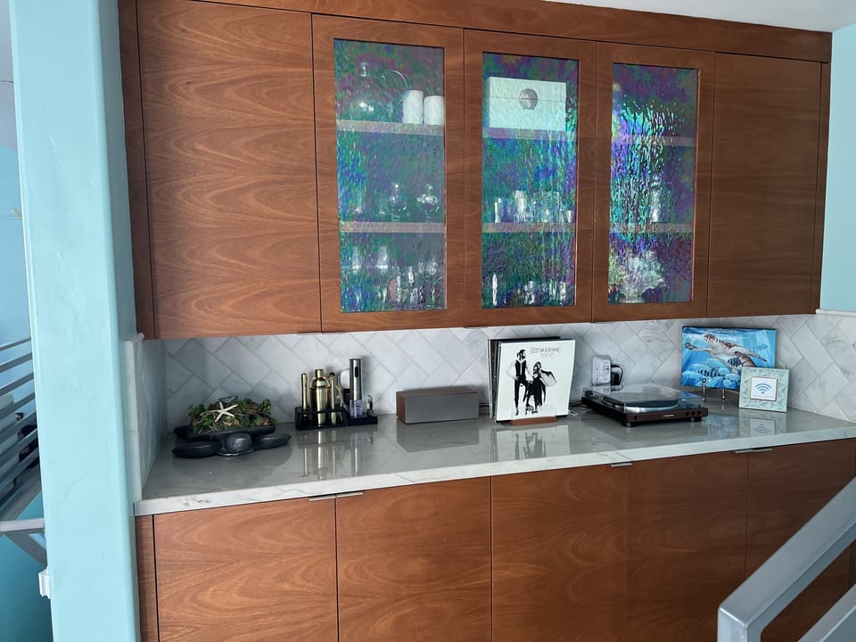 Entertainment Bar 
Stereo & albums
Games, toys, books in bottom cabinets