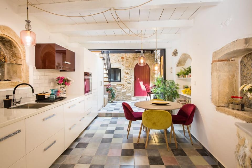 The modern fully equipped kitchen and dining room