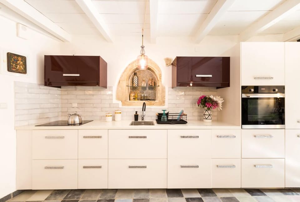 The sophisticated fully equipped kitchen
