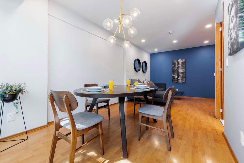 Experience the harmony of high-end design and homely comfort at our dining table.
