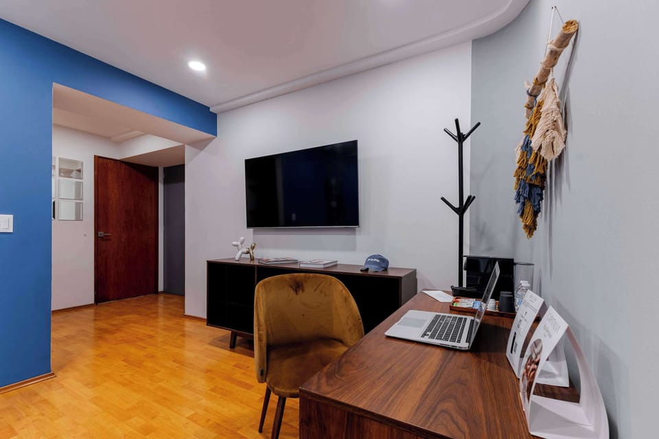 Quiet corner with desk and chair.


