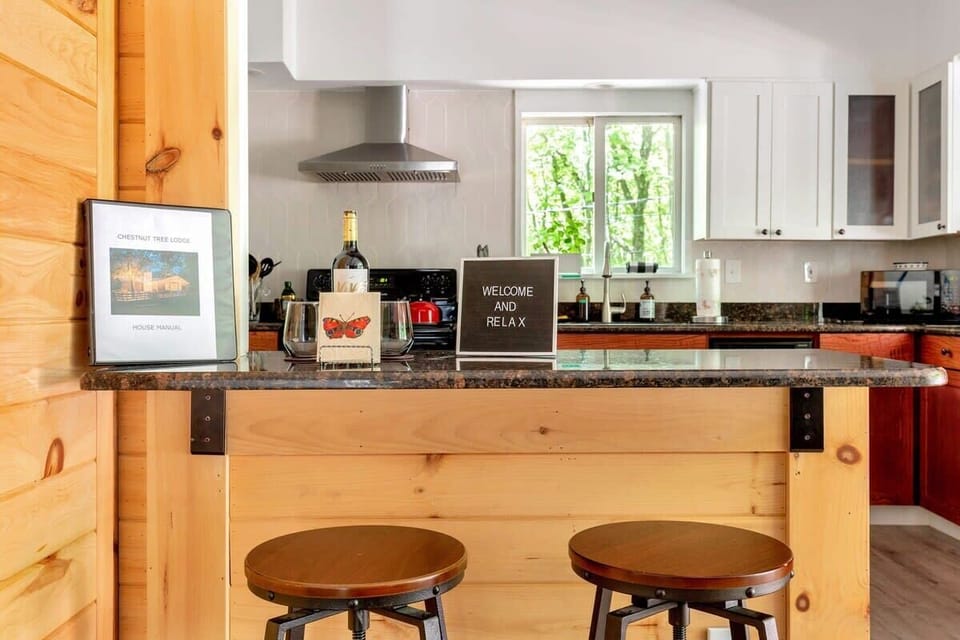 The granite-topped bar offers a great place to perch and chat over a snack and glass of wine.  