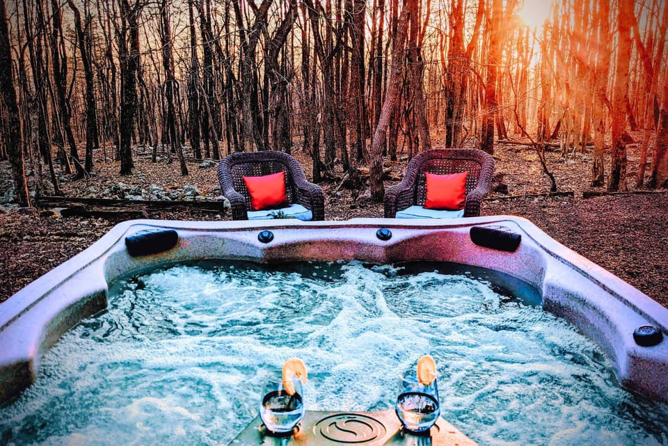 Soaking in the hot tub by the fire pit is the perfect way to unwind after a day of activities!