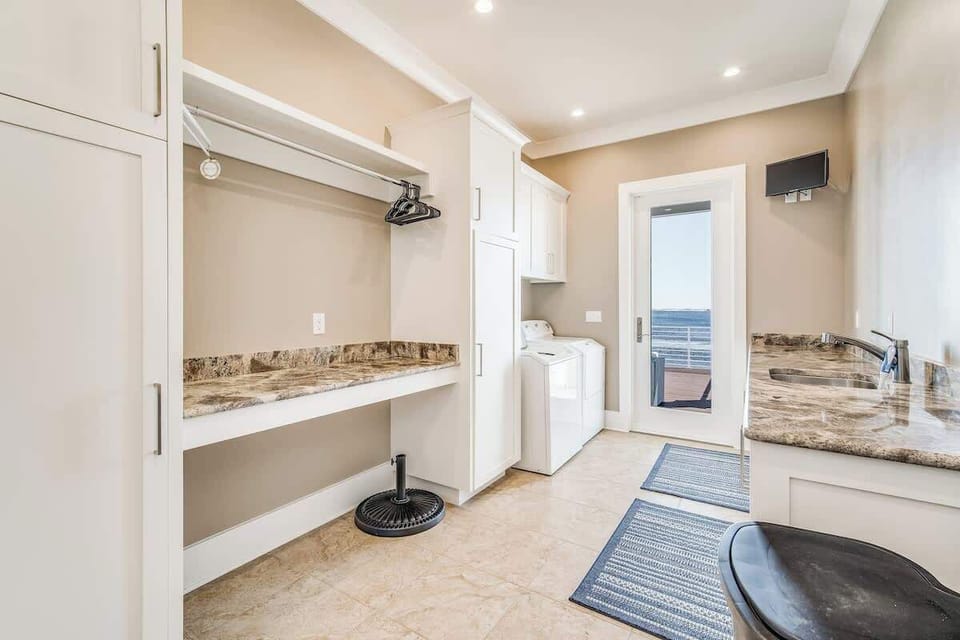 Spacious laundry room offers in unit washer and dryer.