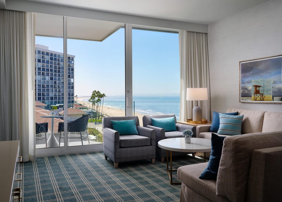 The Views Ocean View Suite 1 King | Living area | 55-inch TV with cable channels, Netflix, streaming services