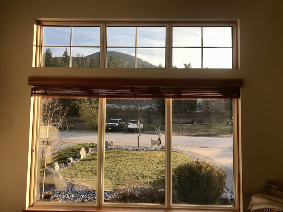 Large window in Upstairs Bedroom overlooking the front lawn