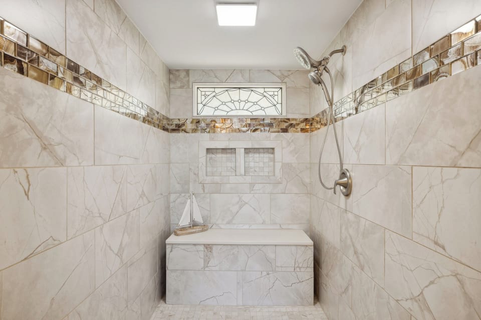 Marble Walk-In Showe with a Seating Area - Take A Shower in Comf