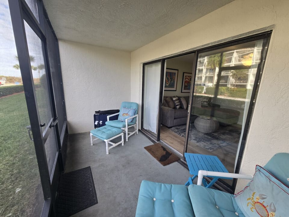 Ground floor patio — step out and reach the sand in 30 seconds